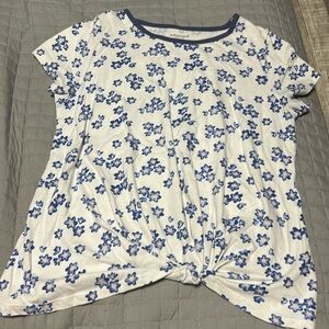 blue flowers on a white shirt